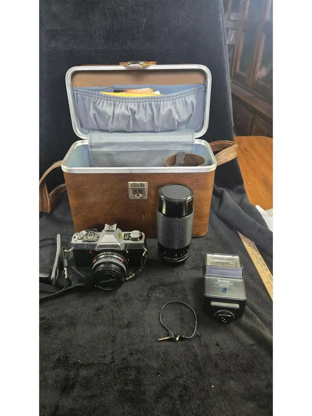 Minolta SLR 35mm Film Camera with Lens, Flash, and Carrying Case